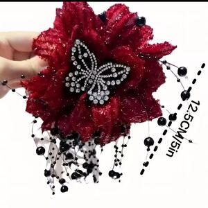 Elegant Red Floral Hair Accessory with Butterfly Design
